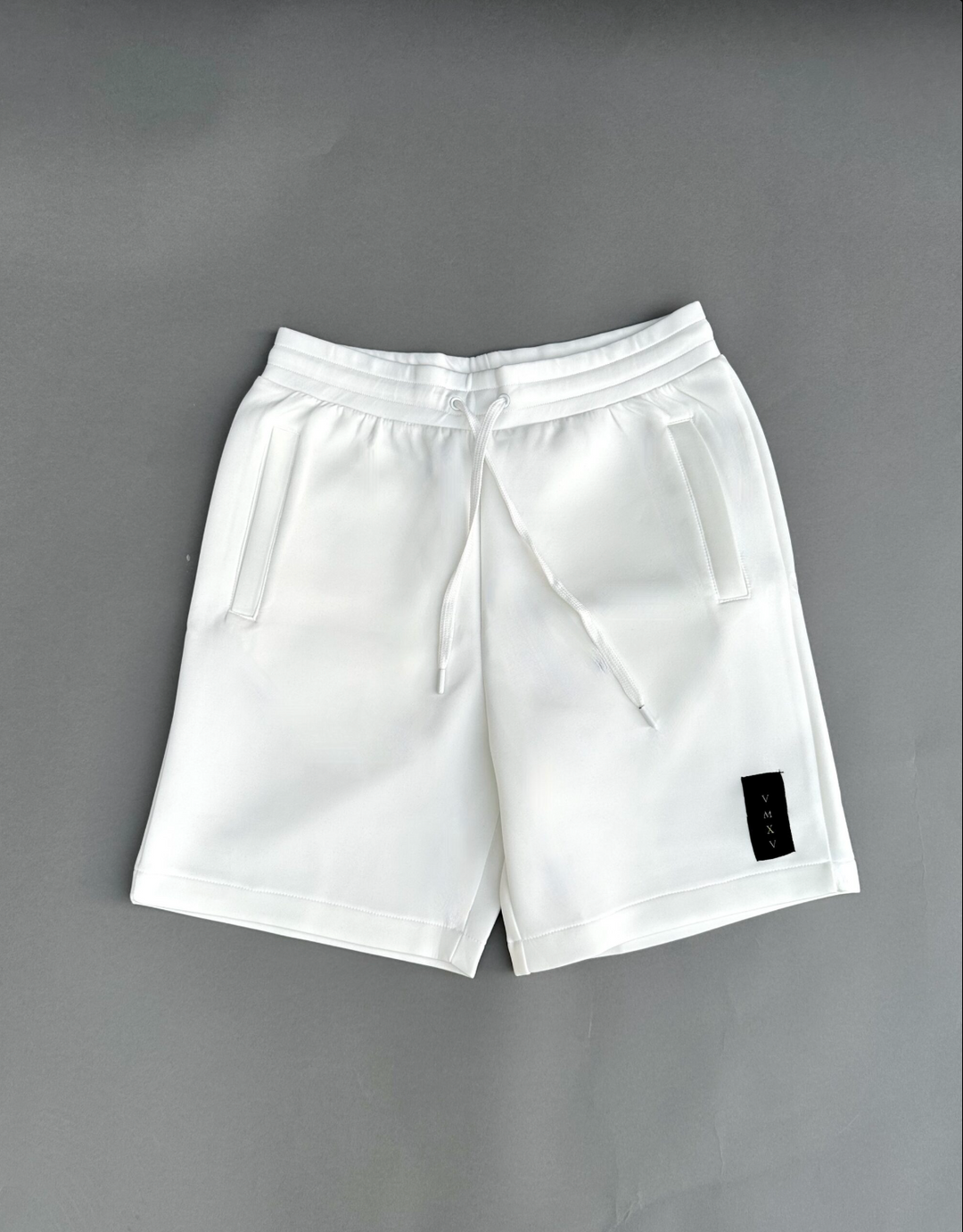 The Ripped Pocket White Shorts