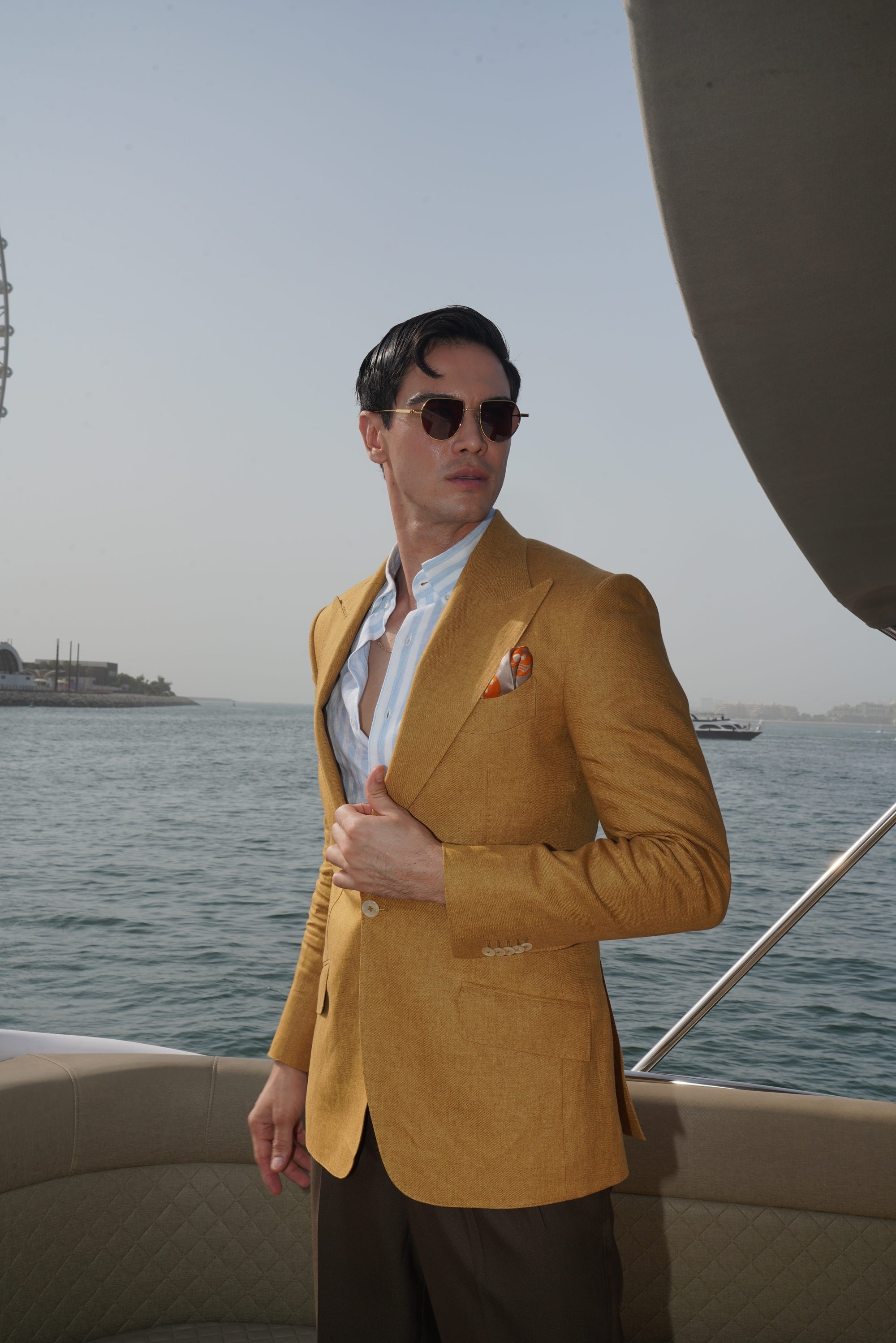 Mustard single-breasted blazer in a linen and silk blend with a peak lapel