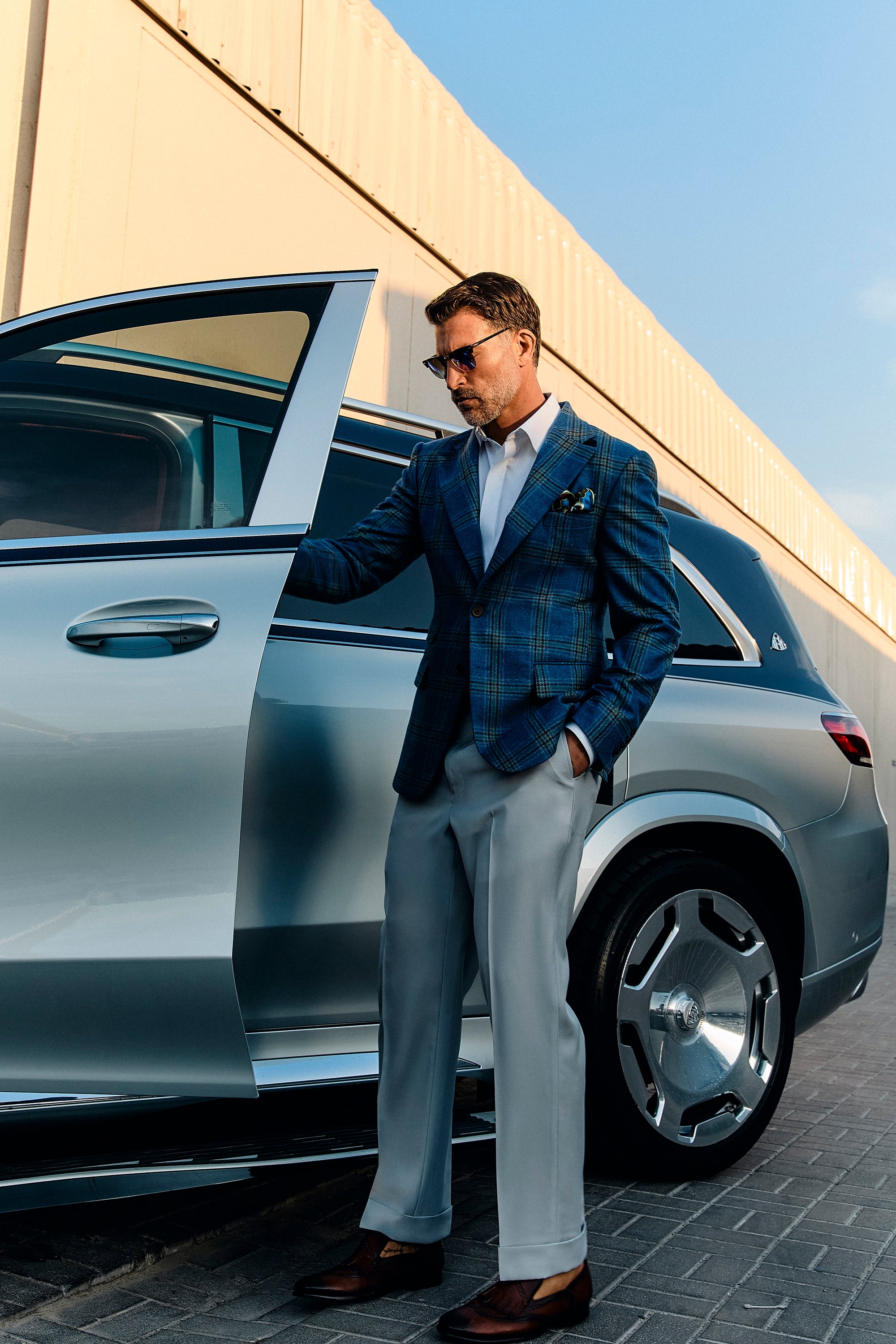 Blue checked single-breasted blazer in wool with a peak lapel