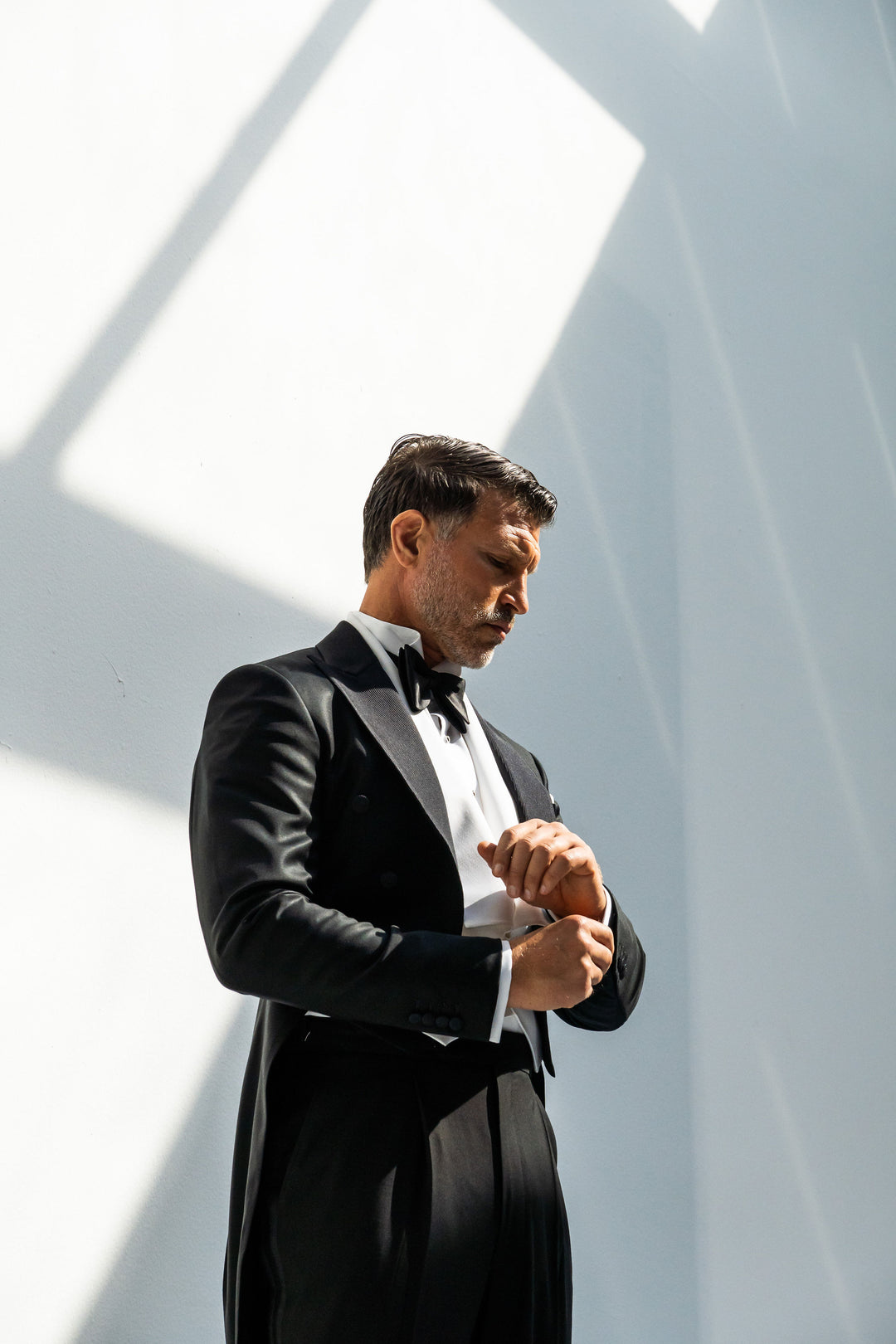 Black tail coat tuxedo