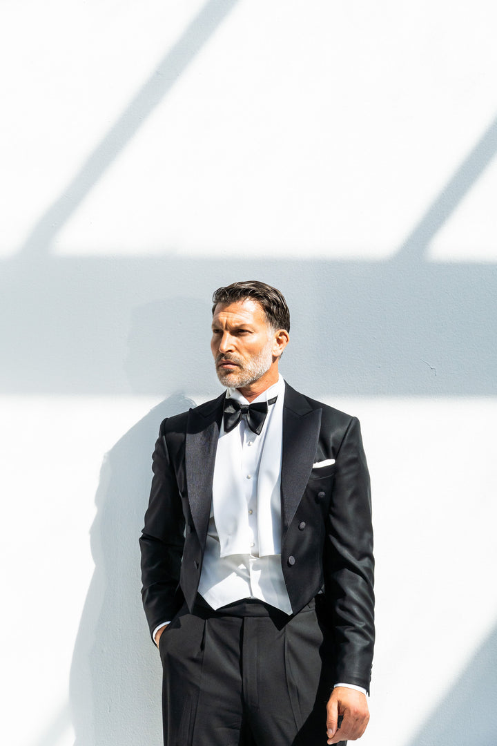 Black tail coat tuxedo