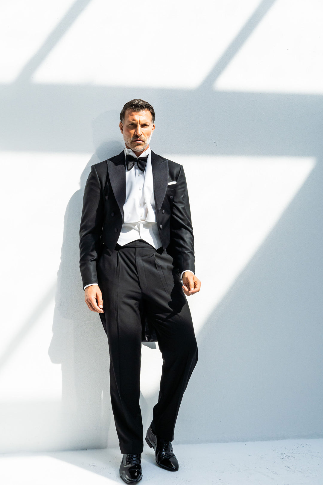 Black tail coat tuxedo