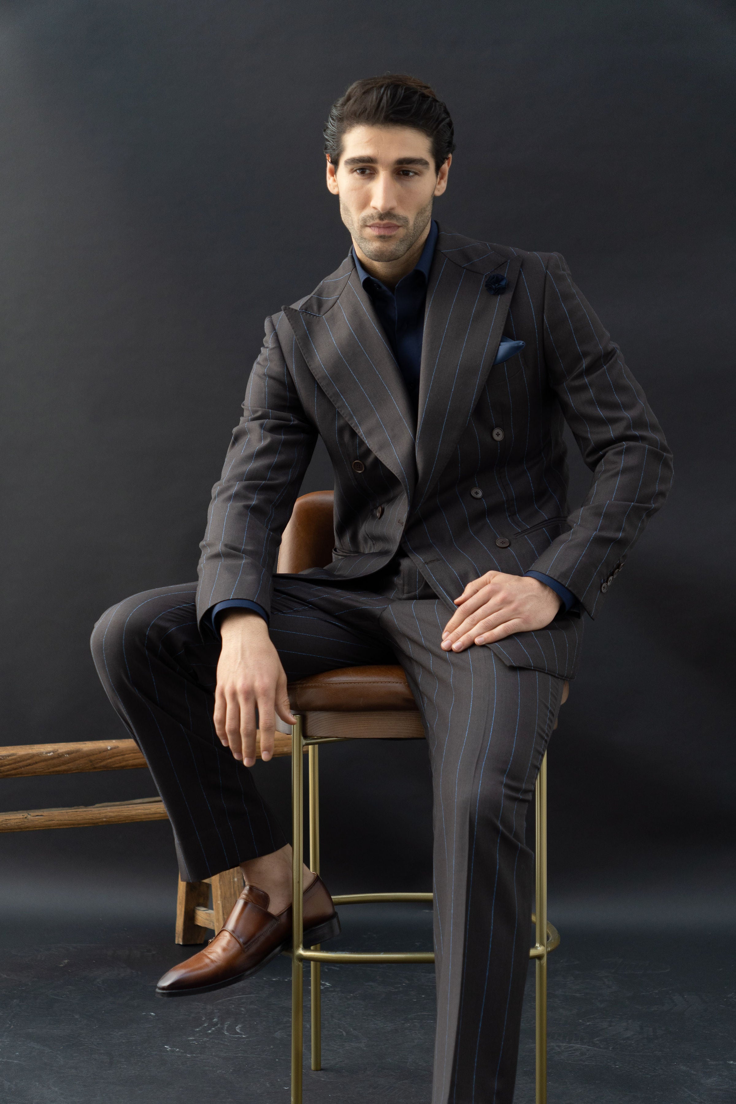 Coffee pinstripe wool double-breasted suit with a notch lapel, alternative cut